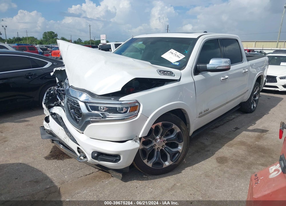 2019 RAM 1500 LIMITED 4X4 5'7 BOX VIN: 1C6SRFHT4KN873456