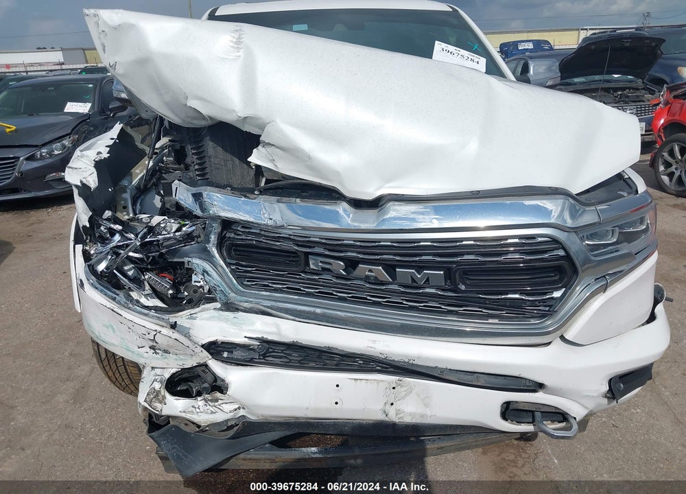 2019 RAM 1500 LIMITED 4X4 5'7 BOX VIN: 1C6SRFHT4KN873456