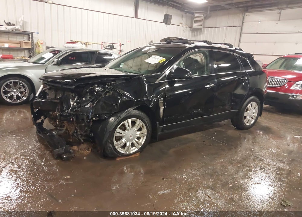2012 CADILLAC SRX LUXURY COLLECTION VIN: 3GYFNDE32CS634200