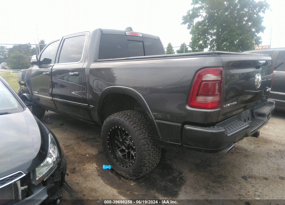 2019 RAM 1500 LIMITED 4X4 5'7 BOX VIN: 1C6SRFHT3KN557756