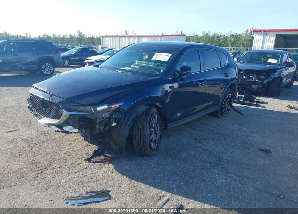 2018 MAZDA CX-5 TOURING VIN: JM3KFACM0J1429900