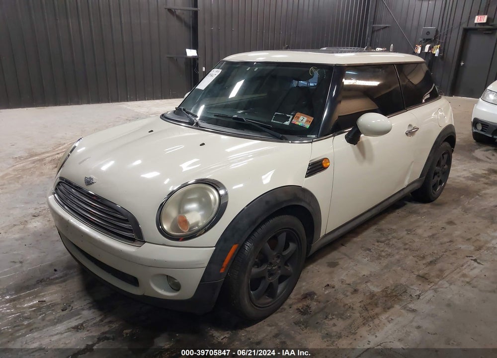 2007 MINI COOPER VIN: WMWMF33597TT58342
