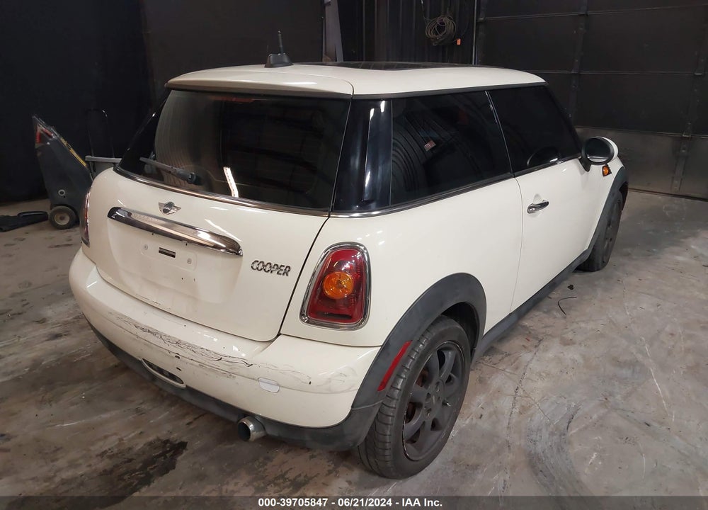 2007 MINI COOPER VIN: WMWMF33597TT58342