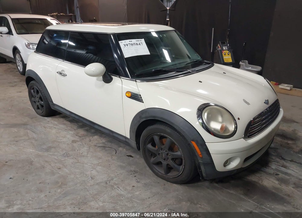2007 MINI COOPER VIN: WMWMF33597TT58342