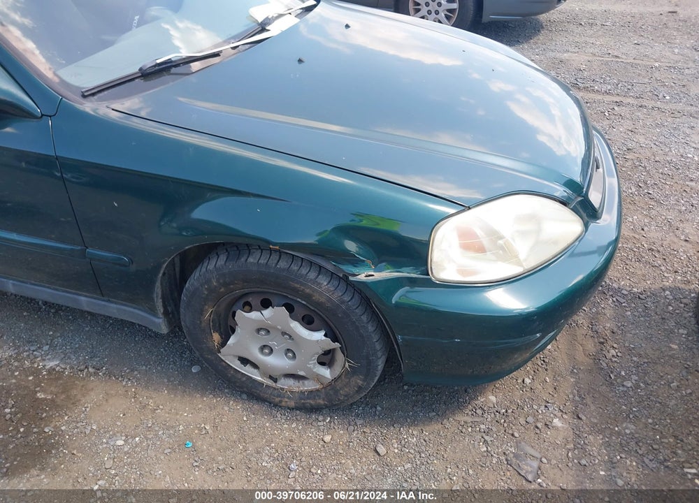 1999 HONDA CIVIC VIN: 1HGEJ8245XL057323