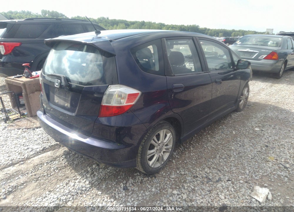 2009 HONDA FIT SPORT VIN: JHMGE88429S019042