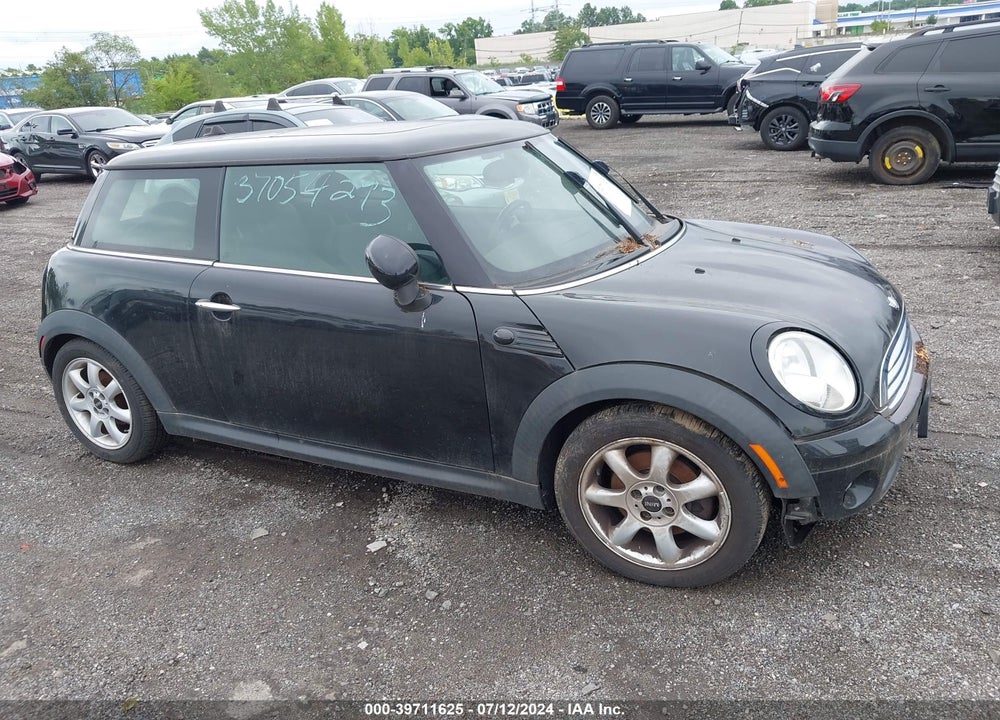 2009 MINI COOPER HARDTOP VIN: WMWMF33519TW73932