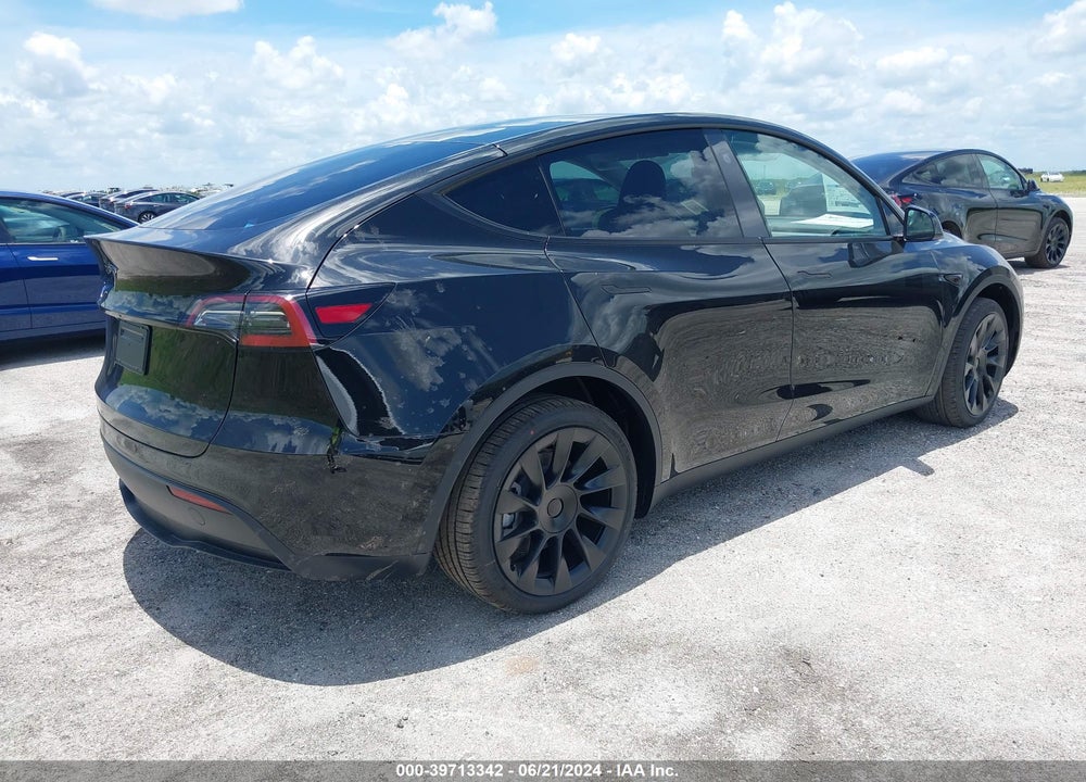 2024 TESLA MODEL Y LONG RANGE/RWD VIN: 7SAYGDED6RF085011