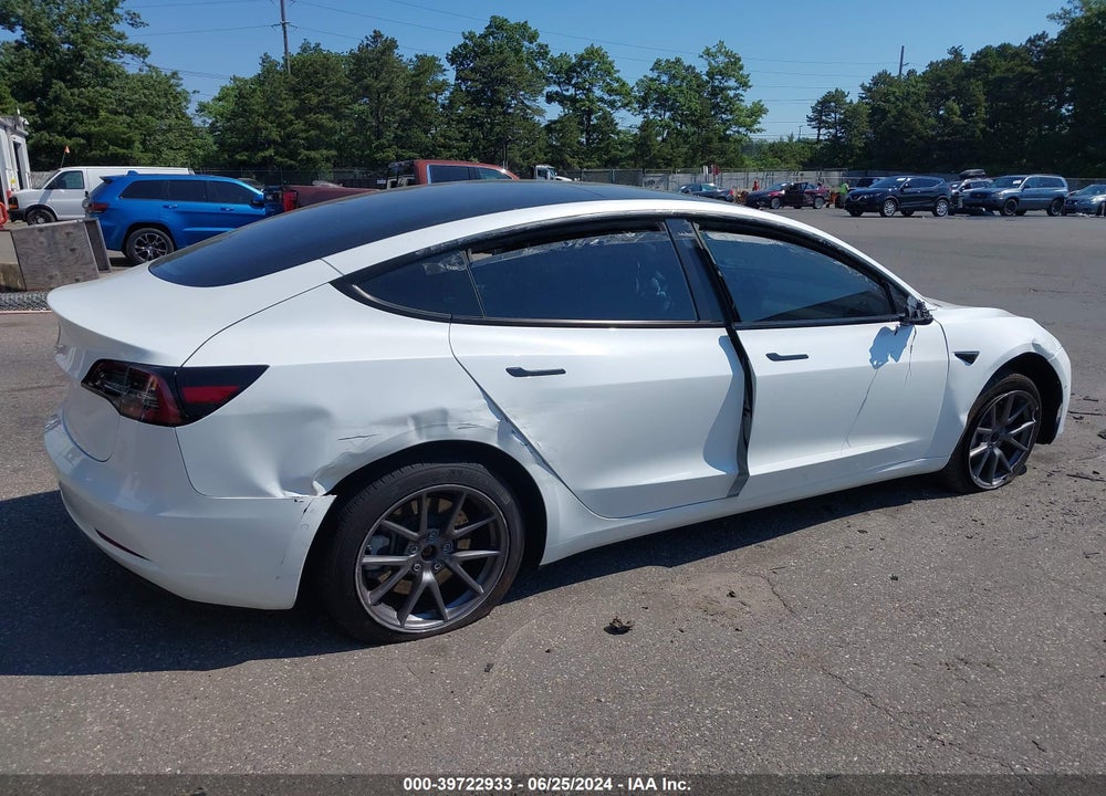 2021 TESLA MODEL 3 STANDARD RANGE PLUS REAR-WHEEL DRIVE VIN: 5YJ3E1EA5MF090825