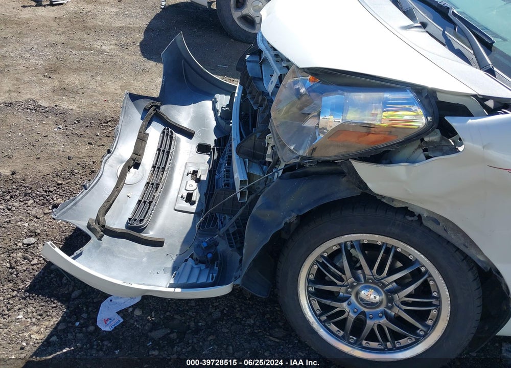 2012 SCION IQ VIN: JTNJJXB0XCJ021312