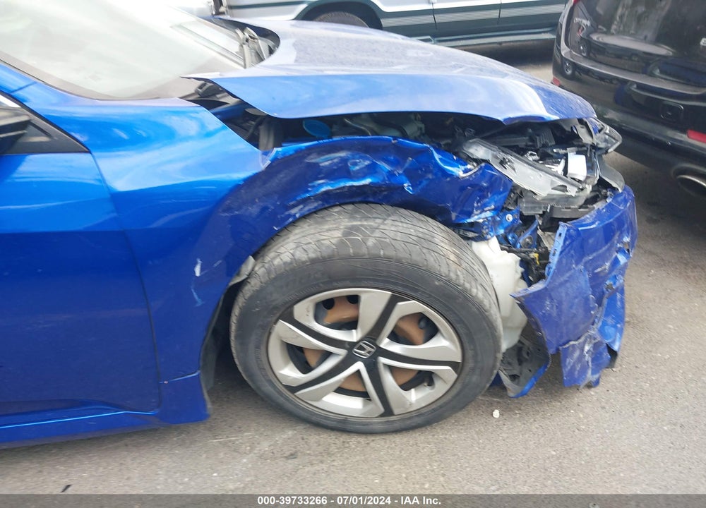 2018 HONDA CIVIC LX VIN: 19XFC2F57JE026474