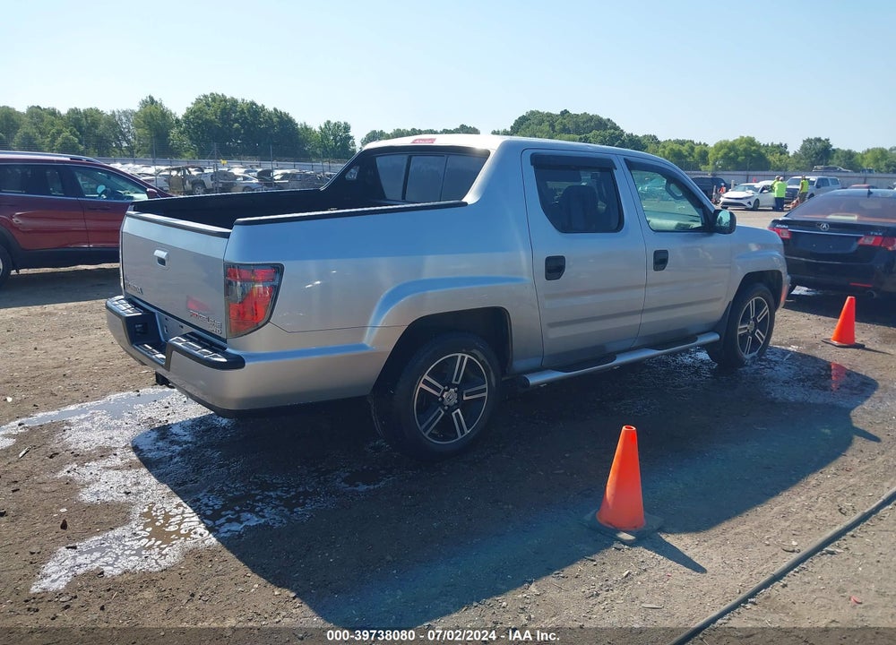 2014 HONDA RIDGELINE SPORT VIN: 5FPYK1F71EB005148