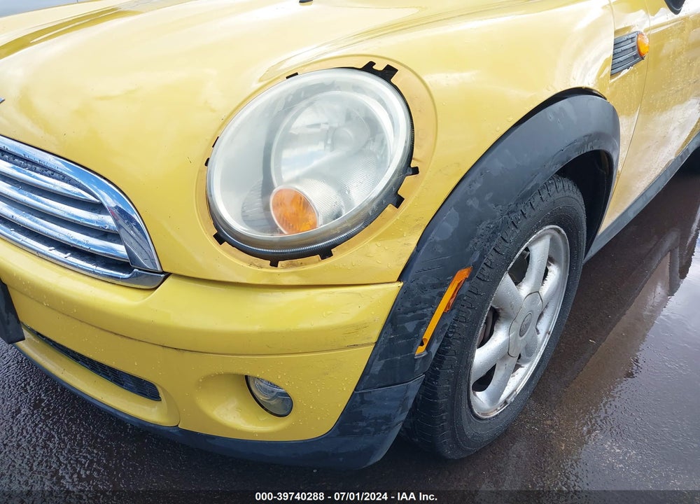 2009 MINI COOPER VIN: WMWMF33579TW73918