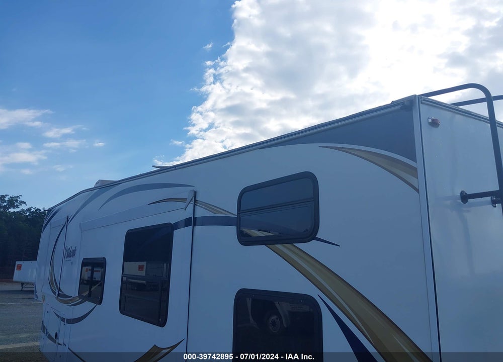 2012 FOREST RIVER WILDCAT 312BHX VIN: 4X4FWCG23CV025817