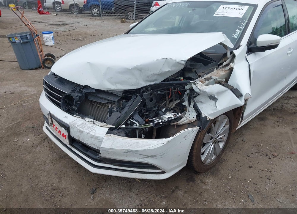 2015 VOLKSWAGEN JETTA 1.8T SE VIN: 3VWD07AJ8FM338475