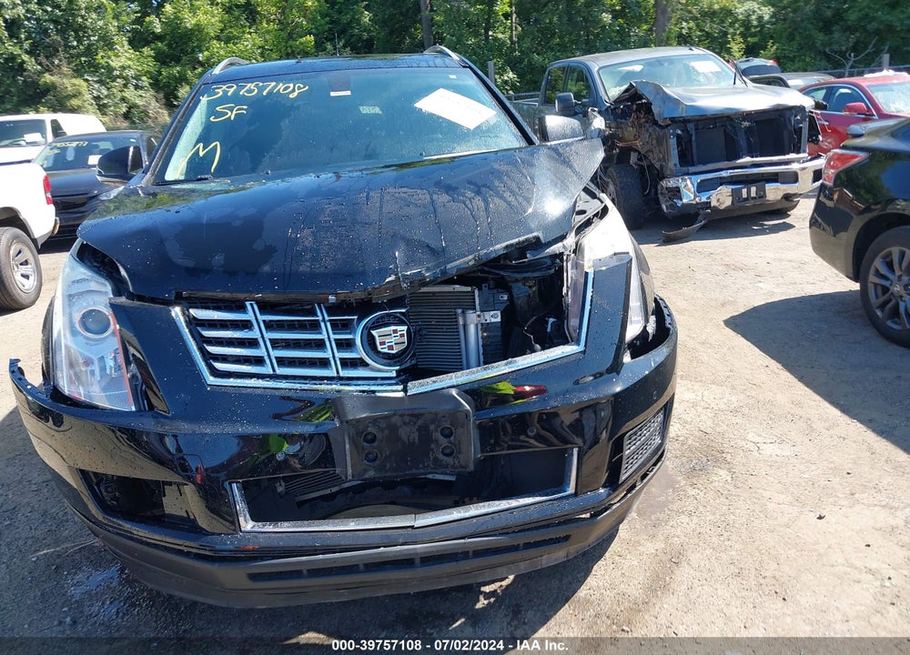 2014 CADILLAC SRX LUXURY COLLECTION VIN: 3GYFNBE34ES610584