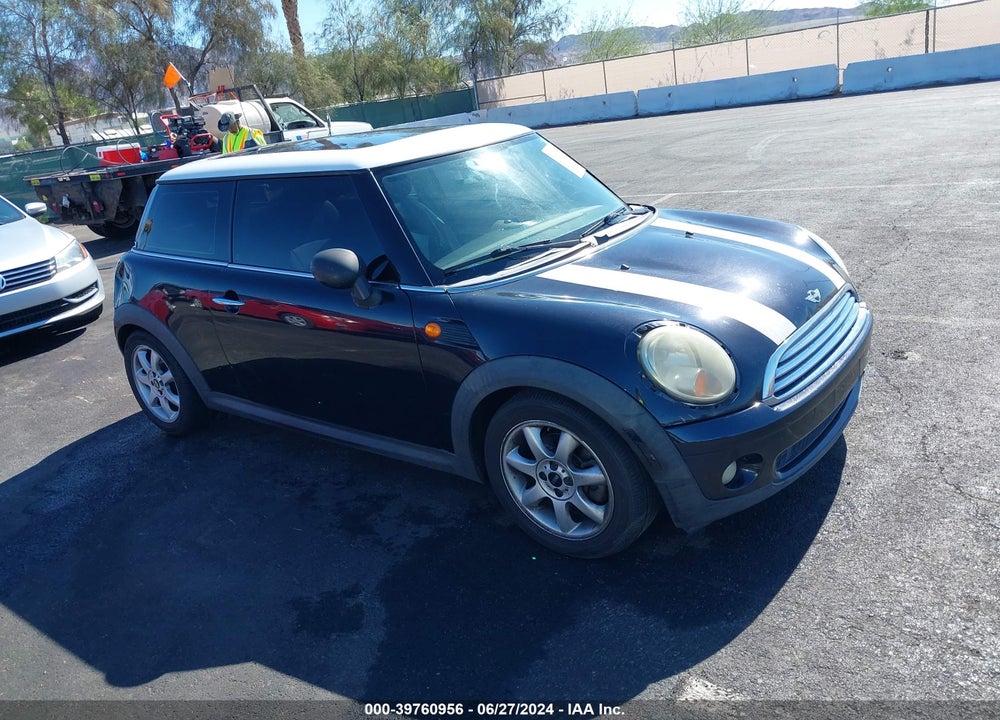 2007 MINI COOPER VIN: WMWMF335X7TT51092