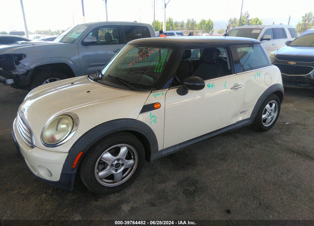2009 MINI COOPER VIN: WMWMF33559TW76395