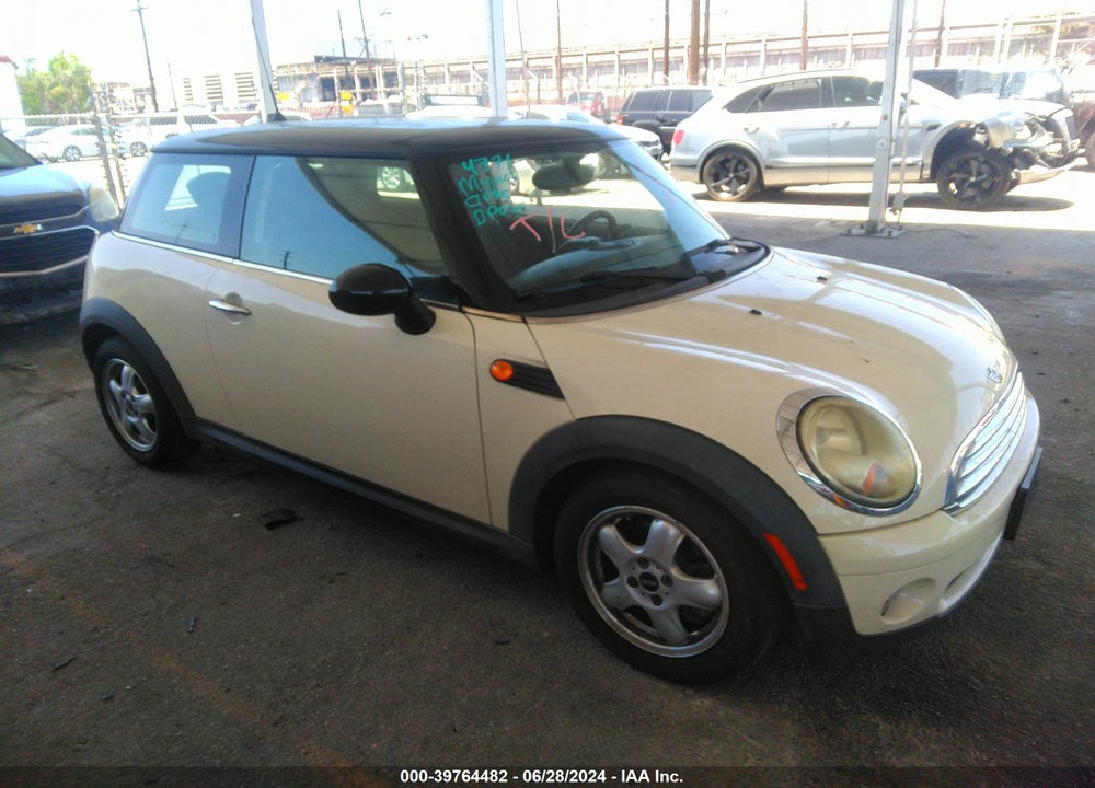 2009 MINI COOPER VIN: WMWMF33559TW76395