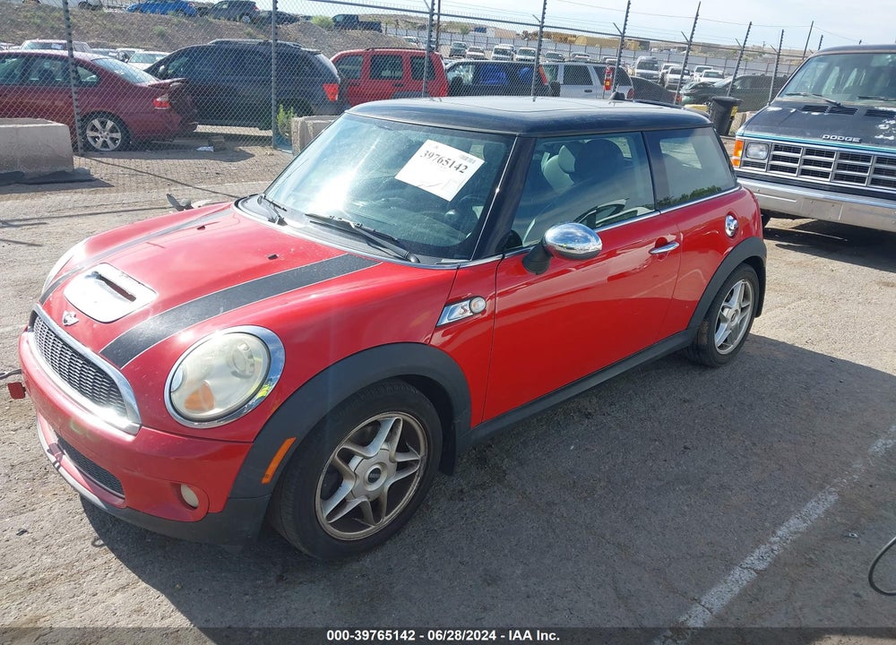 2009 MINI COOPER S VIN: WMWMF73559TT94572