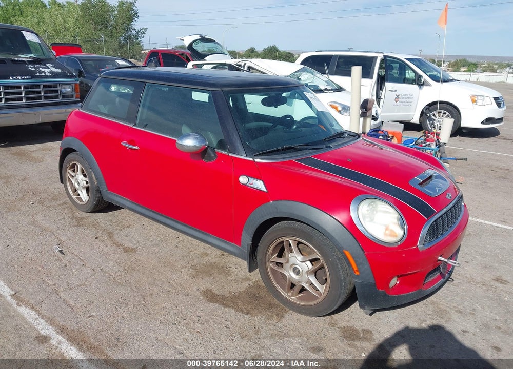 2009 MINI COOPER S VIN: WMWMF73559TT94572
