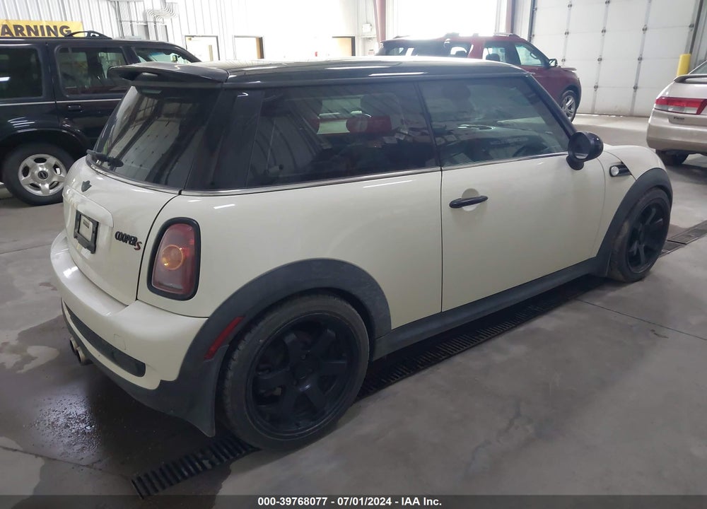 2010 MINI COOPER S VIN: WMWMF7C50ATX42797