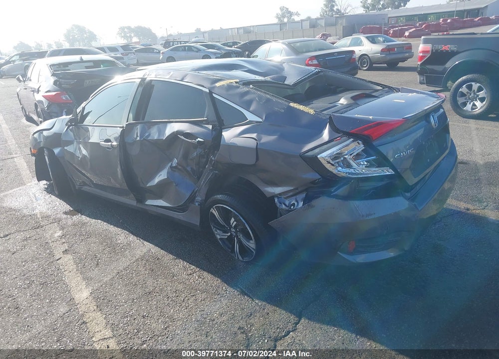 2017 HONDA CIVIC TOURING VIN: 2HGFC1F95HH642249