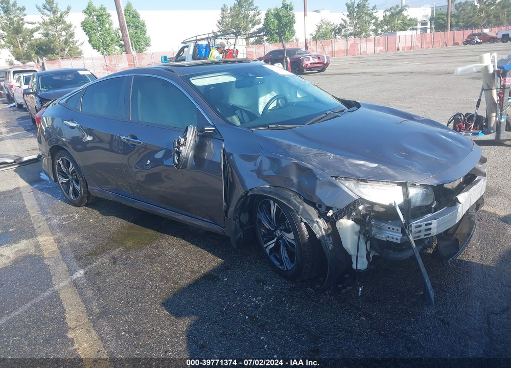 2017 HONDA CIVIC TOURING VIN: 2HGFC1F95HH642249