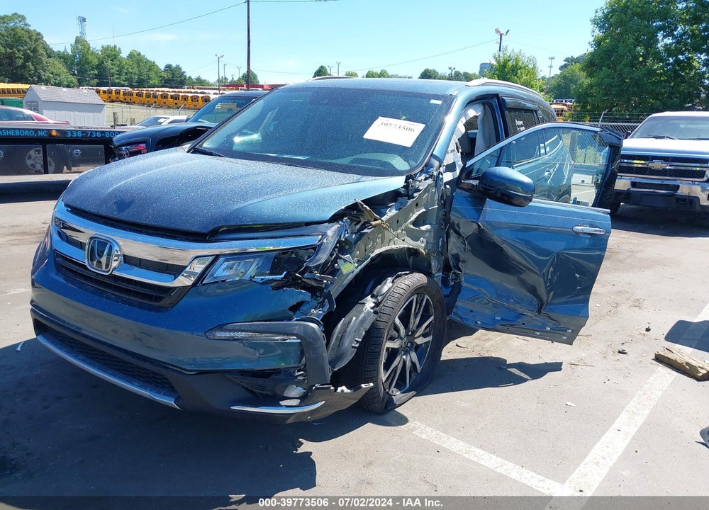 2021 HONDA PILOT 2WD TOURING 7 PASSENGER VIN: 5FNYF5H64MB041410