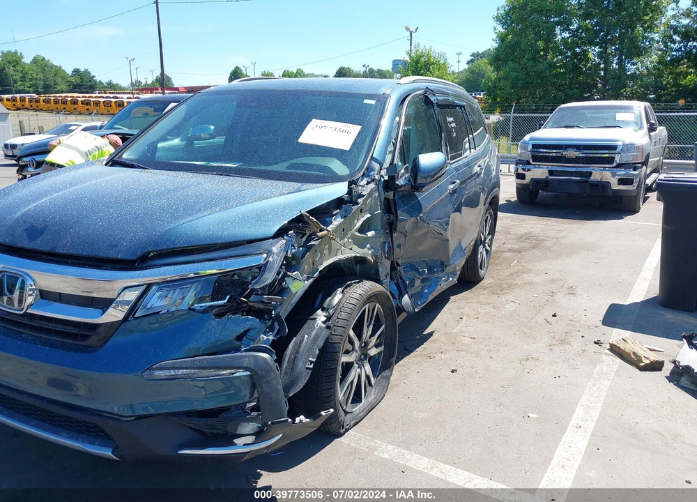 2021 HONDA PILOT 2WD TOURING 7 PASSENGER VIN: 5FNYF5H64MB041410