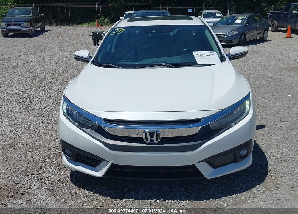 2016 HONDA CIVIC TOURING VIN: 19XFC1F93GE014537