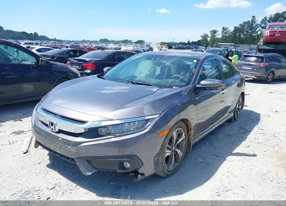 2017 HONDA CIVIC TOURING VIN: 19XFC1F97HE016549