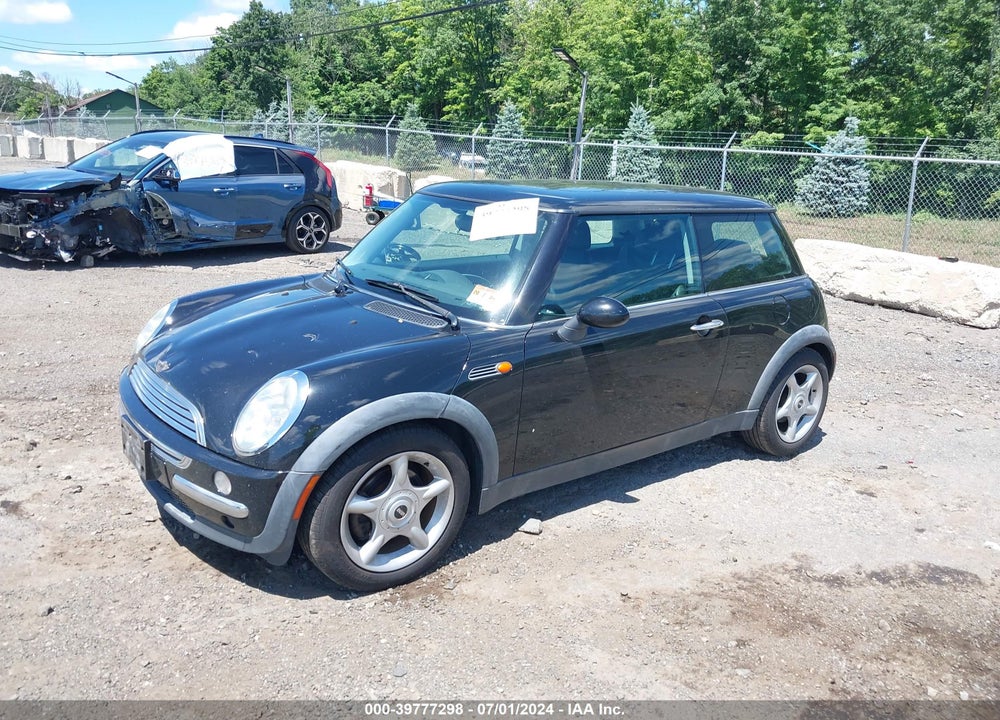 2002 MINI COOPER VIN: WMWRC33472TC36659