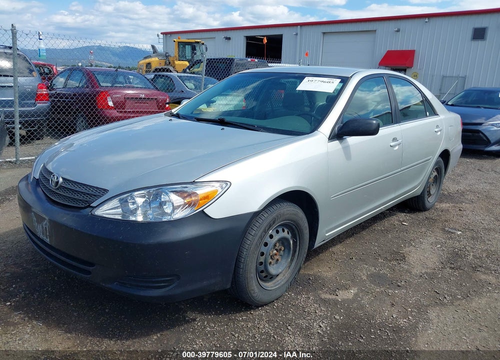 2002 TOYOTA CAMRY LE VIN: JTDBE32K420064104