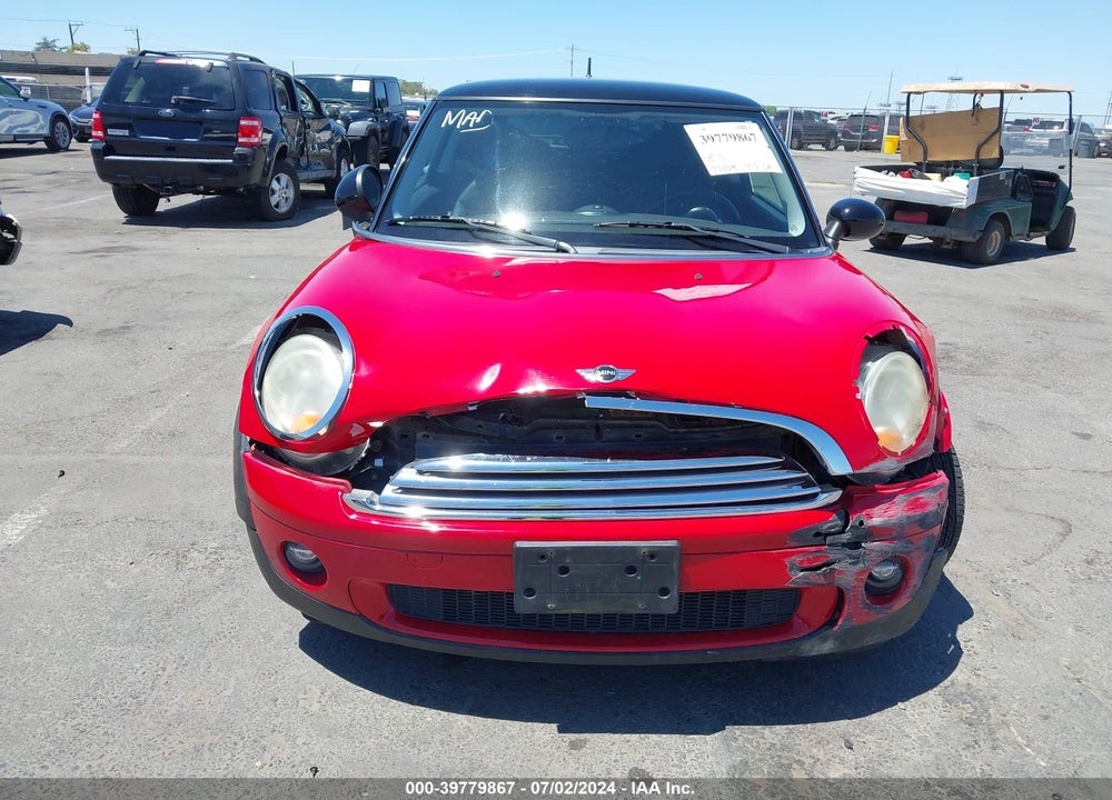2009 MINI COOPER VIN: WMWMF33589TW70865