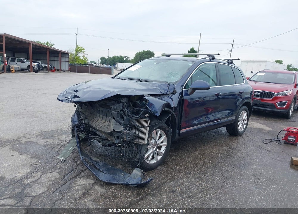 2014 VOLKSWAGEN TOUAREG TDI SPORT VIN: WVGEP9BP7ED007104
