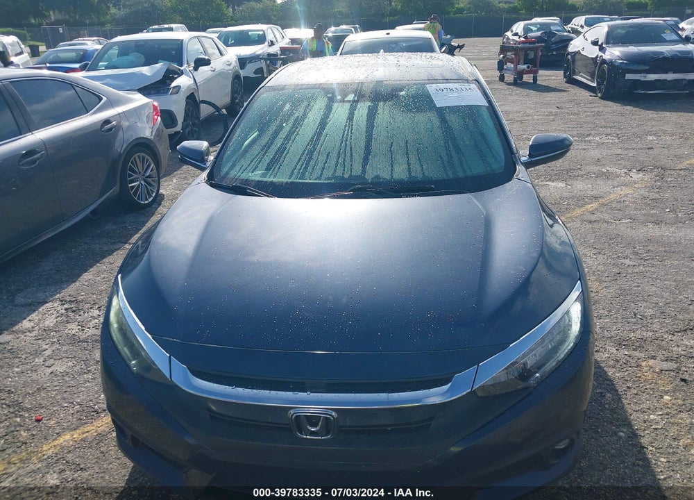 2016 HONDA CIVIC TOURING VIN: 19XFC1F91GE040277