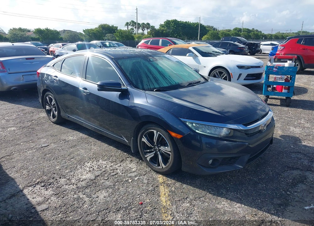 2016 HONDA CIVIC TOURING VIN: 19XFC1F91GE040277