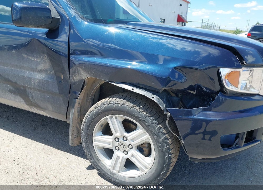2010 HONDA RIDGELINE RTL VIN: 5FPYK1F53AB004494