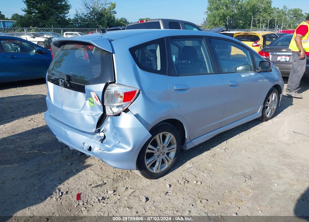 2009 HONDA FIT SPORT VIN: JHMGE88429S031143