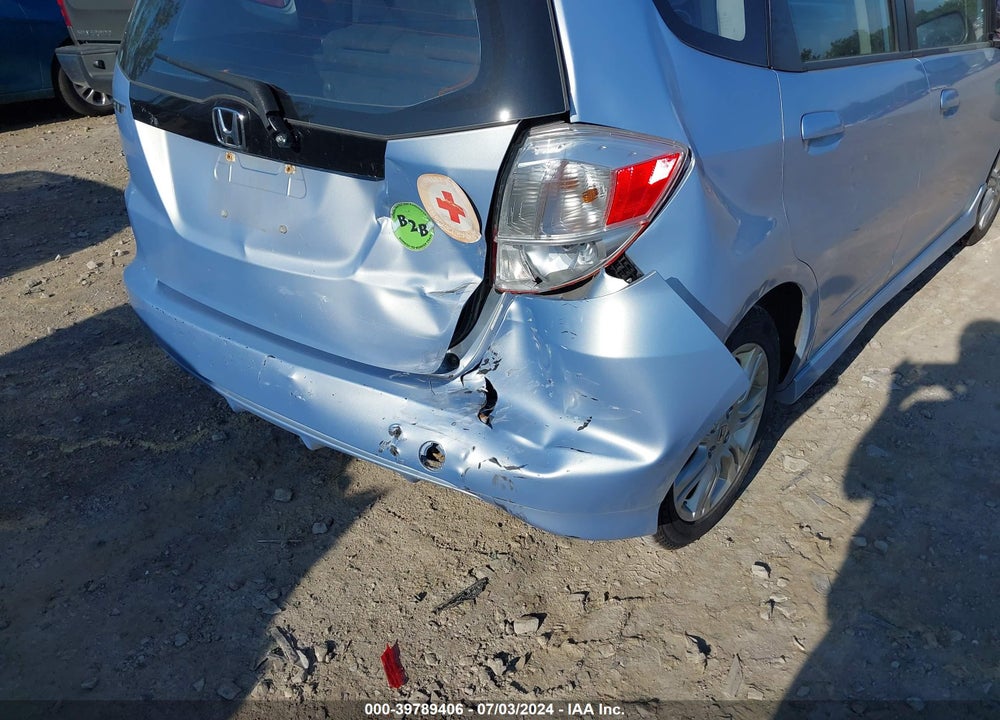2009 HONDA FIT SPORT VIN: JHMGE88429S031143