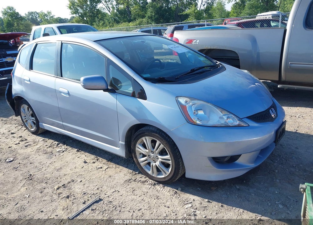 2009 HONDA FIT SPORT VIN: JHMGE88429S031143