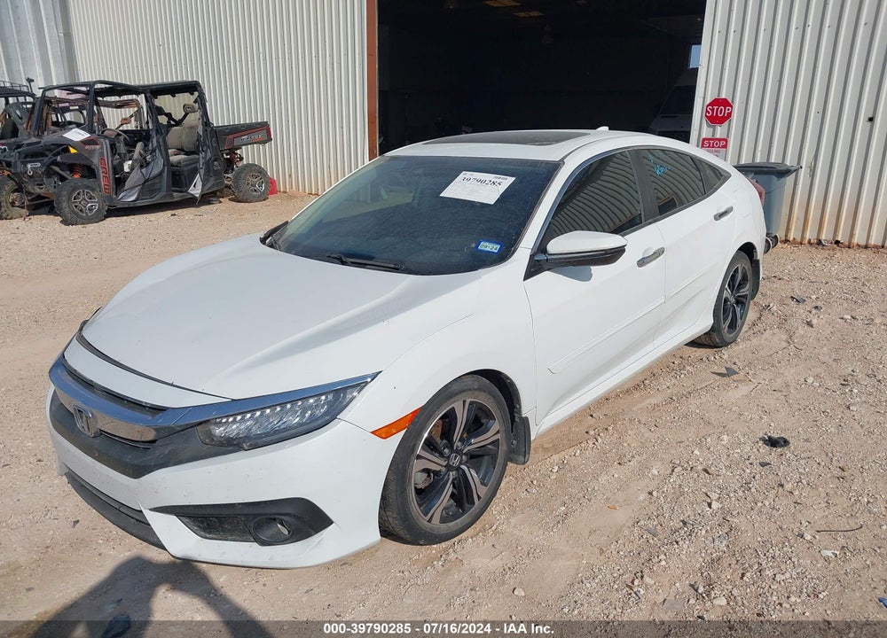 2018 HONDA CIVIC TOURING VIN: JHMFC1F94JX040120