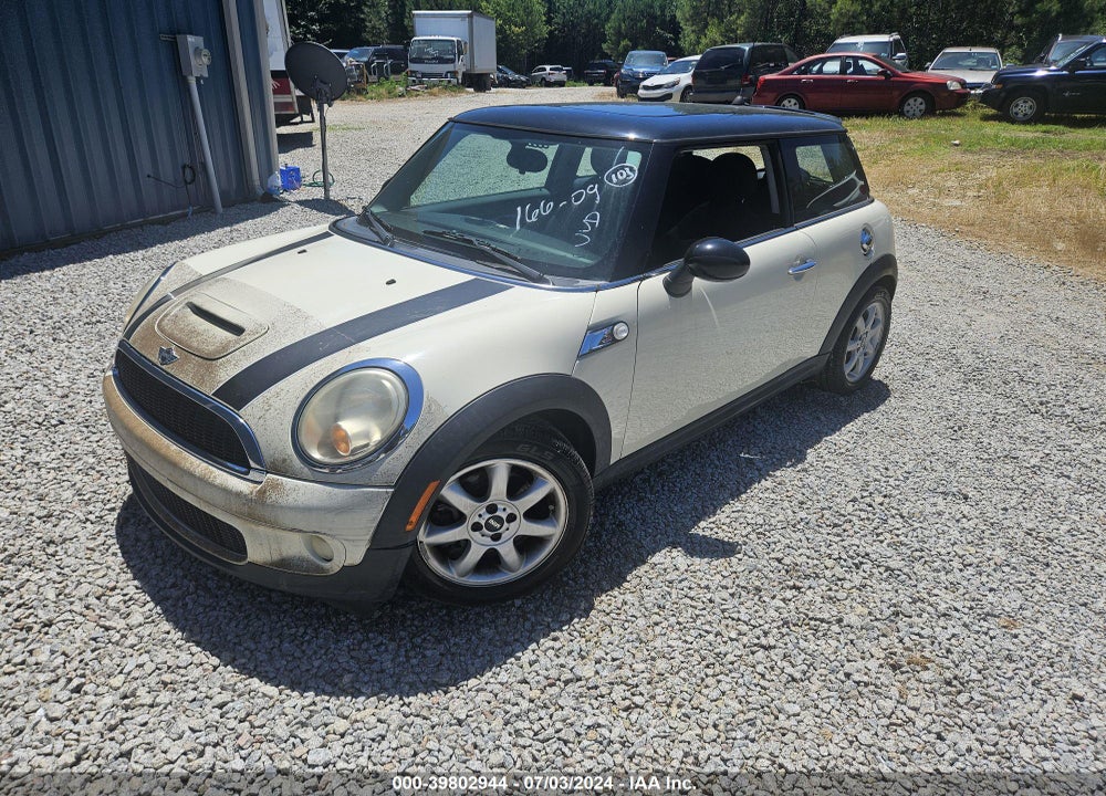 2009 MINI COOPER VIN: WMWMF73539TW85247