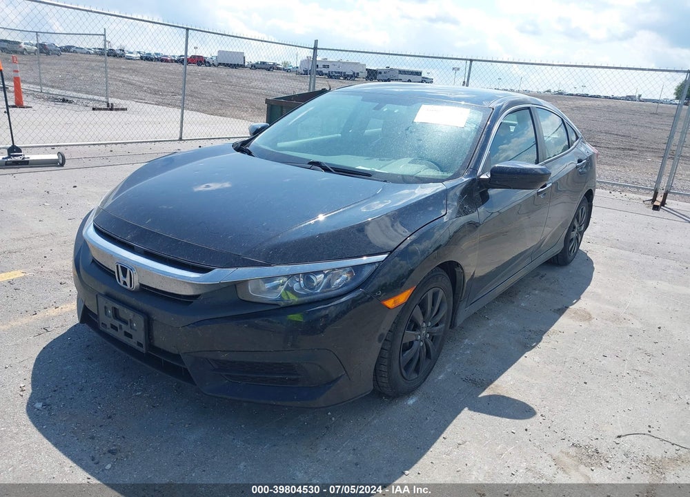 2018 HONDA CIVIC LX VIN: 19XFC2F57JE027222