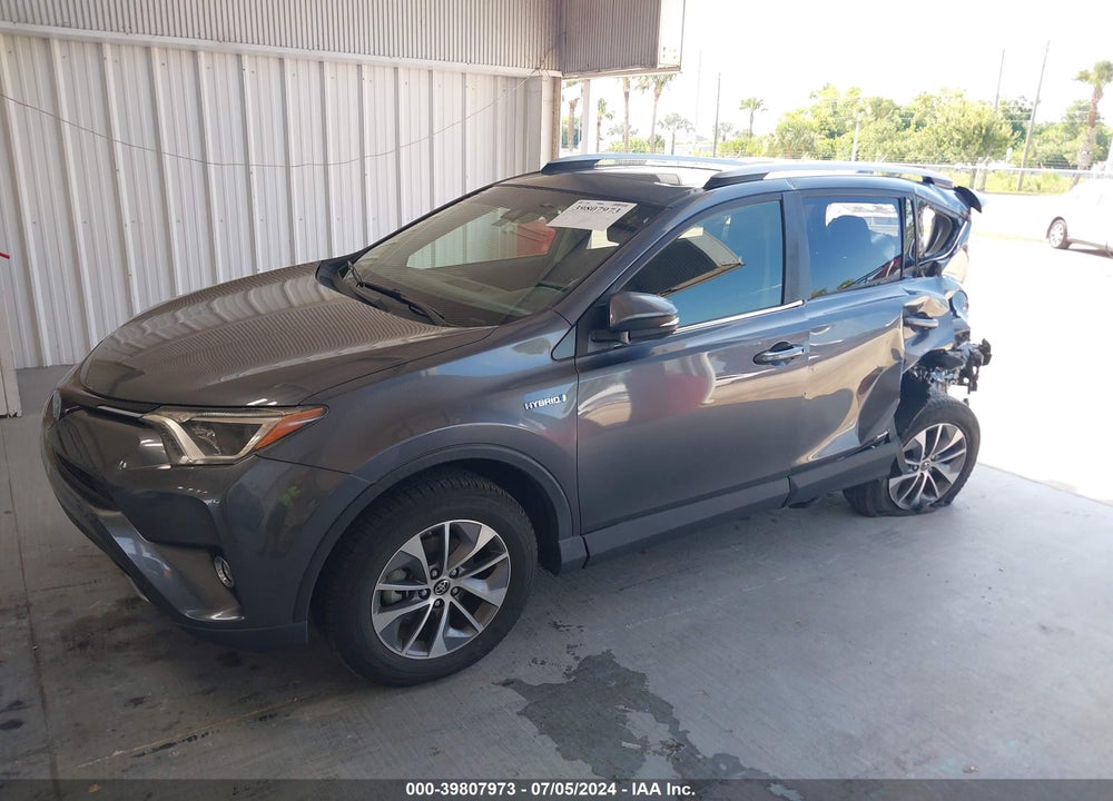 2018 TOYOTA RAV4 HYBRID XLE VIN: JTMRJREV0JD253276