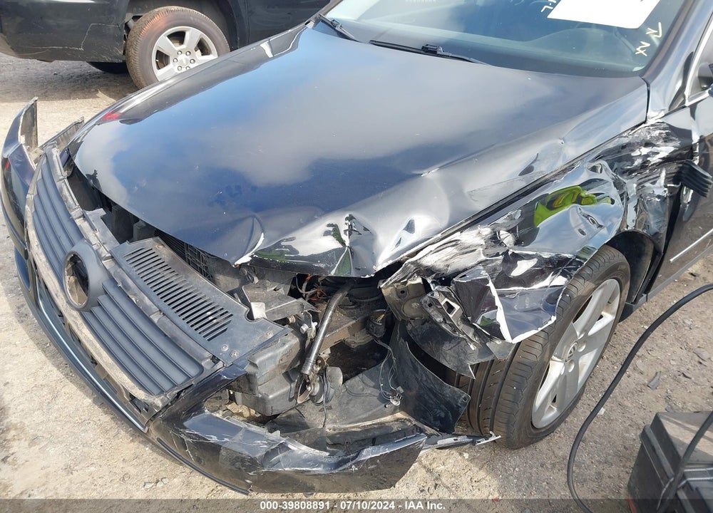 2009 VOLKSWAGEN PASSAT KOMFORT VIN: WVWXK73C29E095202