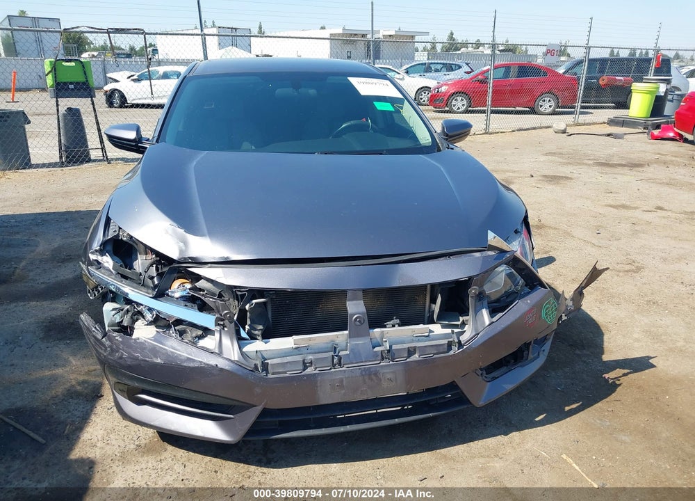 2018 HONDA CIVIC LX VIN: 2HGFC2F5XJH520558
