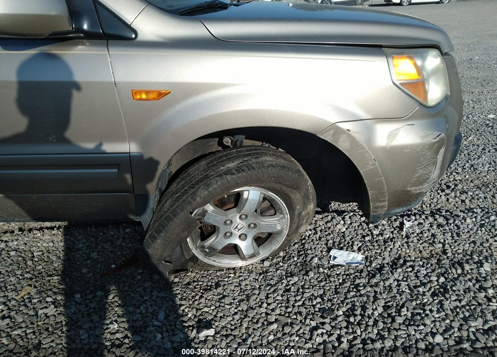 2007 HONDA PILOT EX-L VIN: 5FNYF186X7B007582