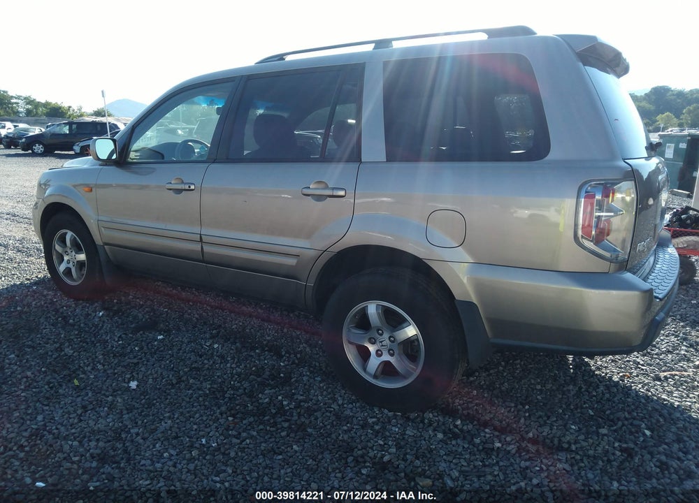 2007 HONDA PILOT EX-L VIN: 5FNYF186X7B007582